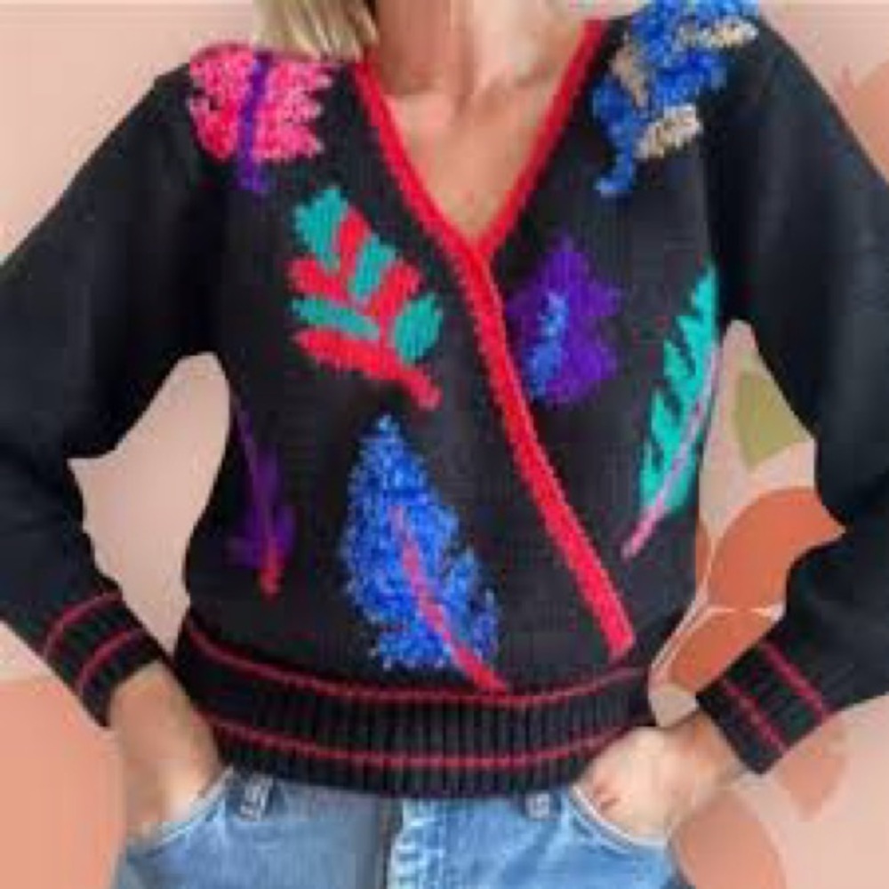 Ginenne black sweater with a colorful leaf pattern